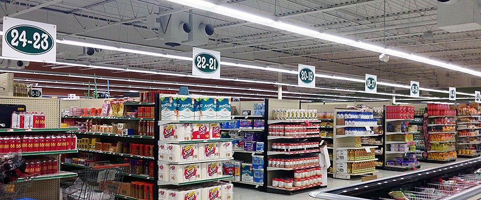 Numbered aisles under high ceilings