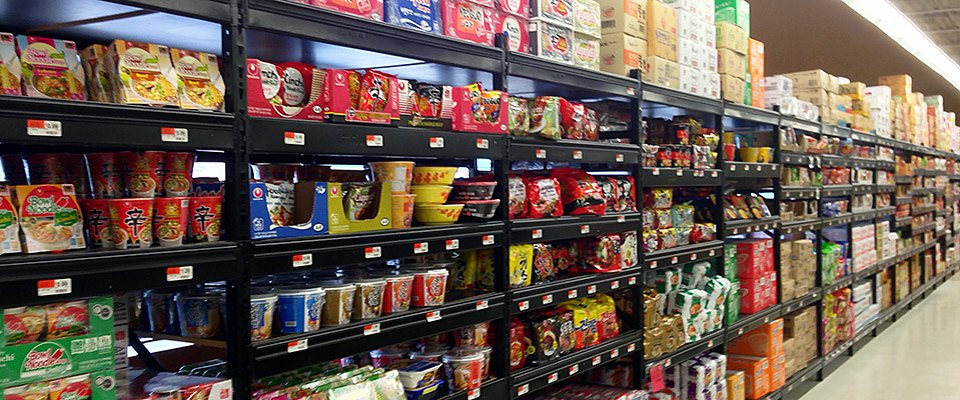 Shelves of instant noodles and packaged Asian foods